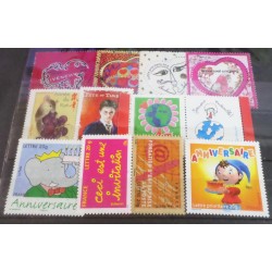 LOT 12 TIMBRES NEUFS**...